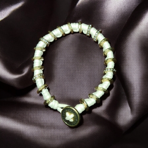 Fossil Knotted Cream String and Metal Disc Bracelet - Picture 1 of 6